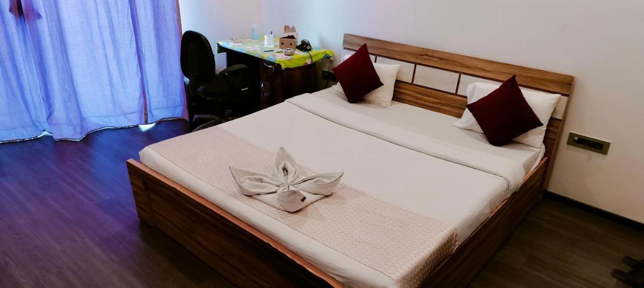 Guest House Service Apartments Púna Kültér fotó